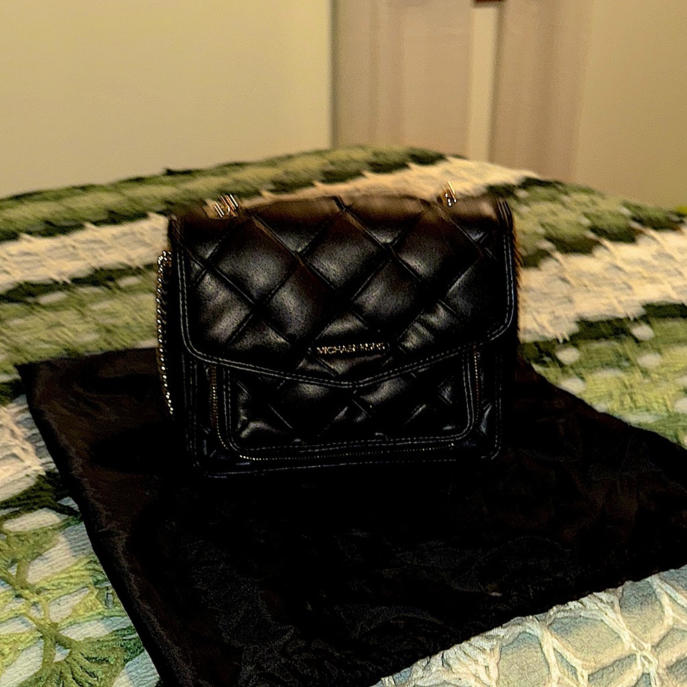 Pristine condition,Black Quilted Micheal Kors shoulder bag.